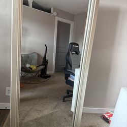 Ashley’s tall mirror 5.9 tall  Has storage in back