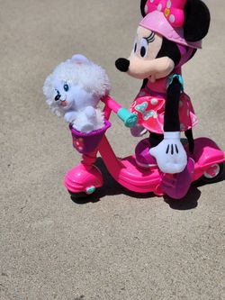Minnie Mouse on a Scooter 