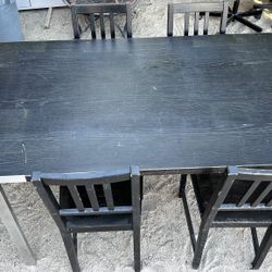 BLACK 78 X 36 X 29 DINING ROOM TABLE 4 CHAIRS 47TH AVE. AND DOBBINS IN LAVEEN