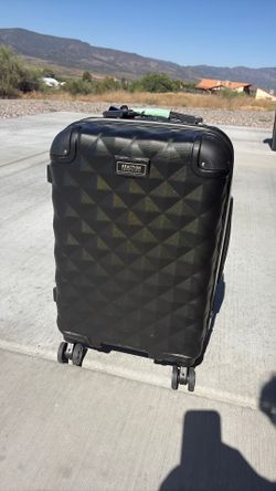 Carry-on suitcase by Kenneth Cole reaction collection