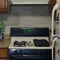 Both for $395 Kenmore Gas Stove And Frigidaire Refrigerator