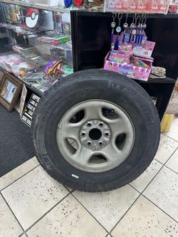 Michelin 235/75R16 Tire and Rim