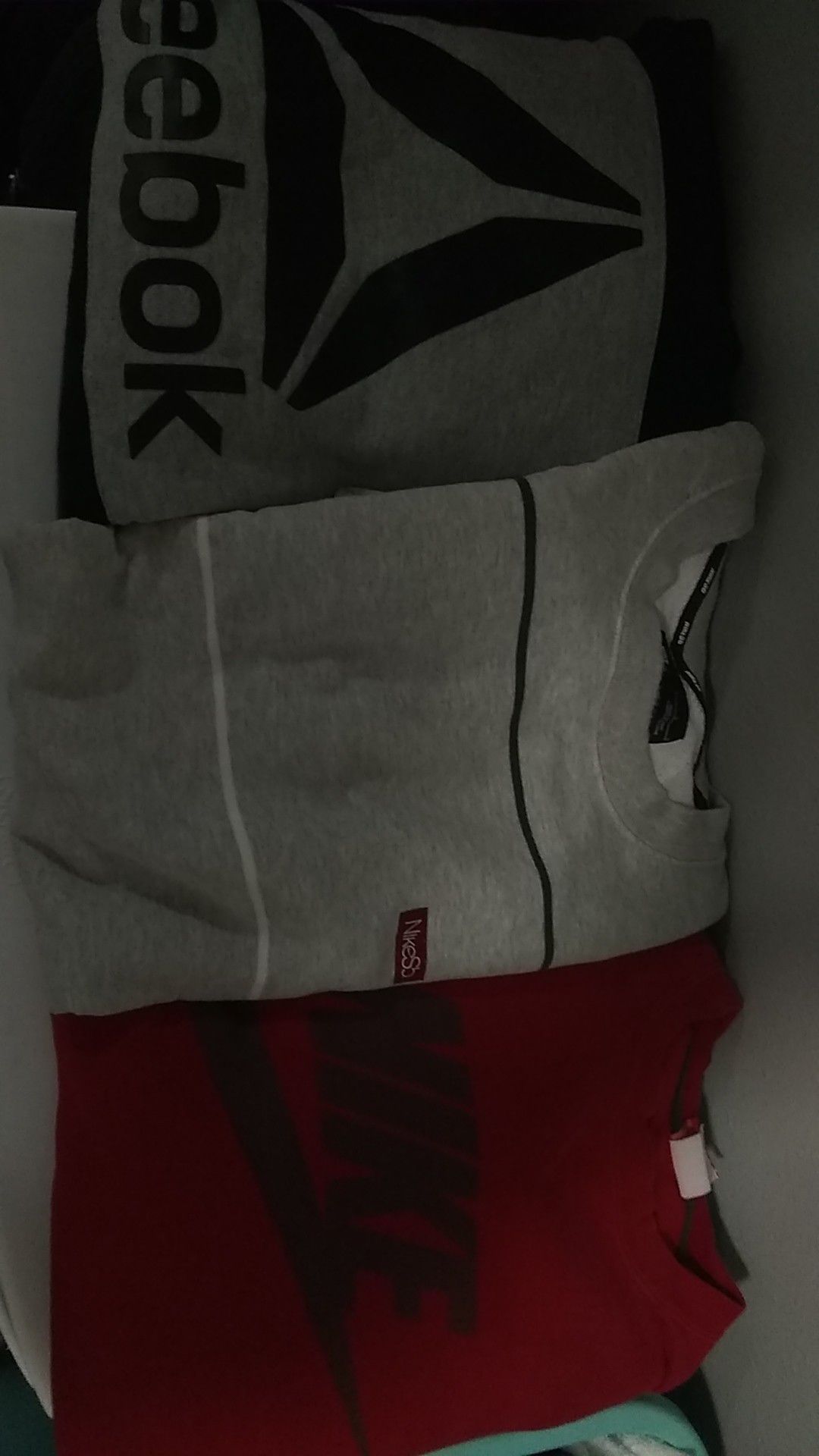 Reebok and Nike sweatshirts