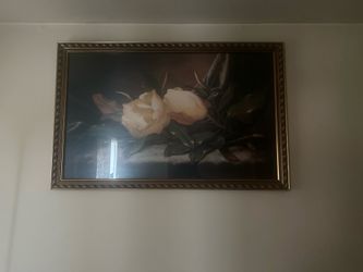 dining room set with wall decor