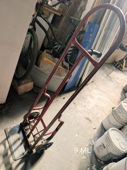 Dolly with push off lever