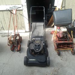 Two mowers and an edger