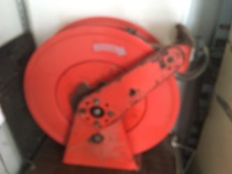 Mc Leland hose reel with 100’ oxygen & accel