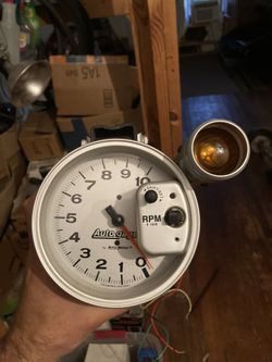 Wide Band Gauge And A Automeater Tachometer