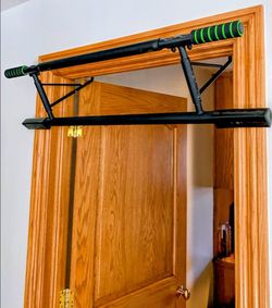 IKON fitness exercise pull chin up bar installs over the doorway