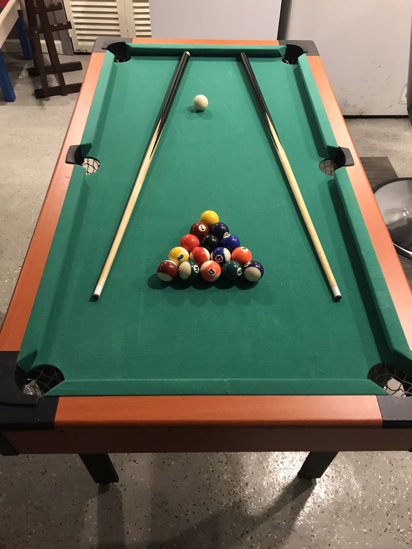 4 ft pool table for children!! Pool balls and sticks!!
