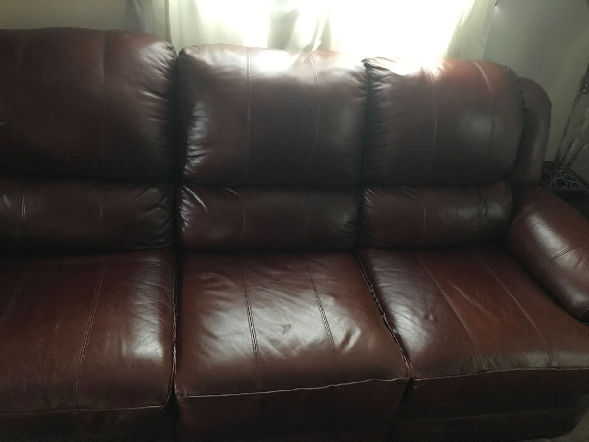 Burgundy leather sofa