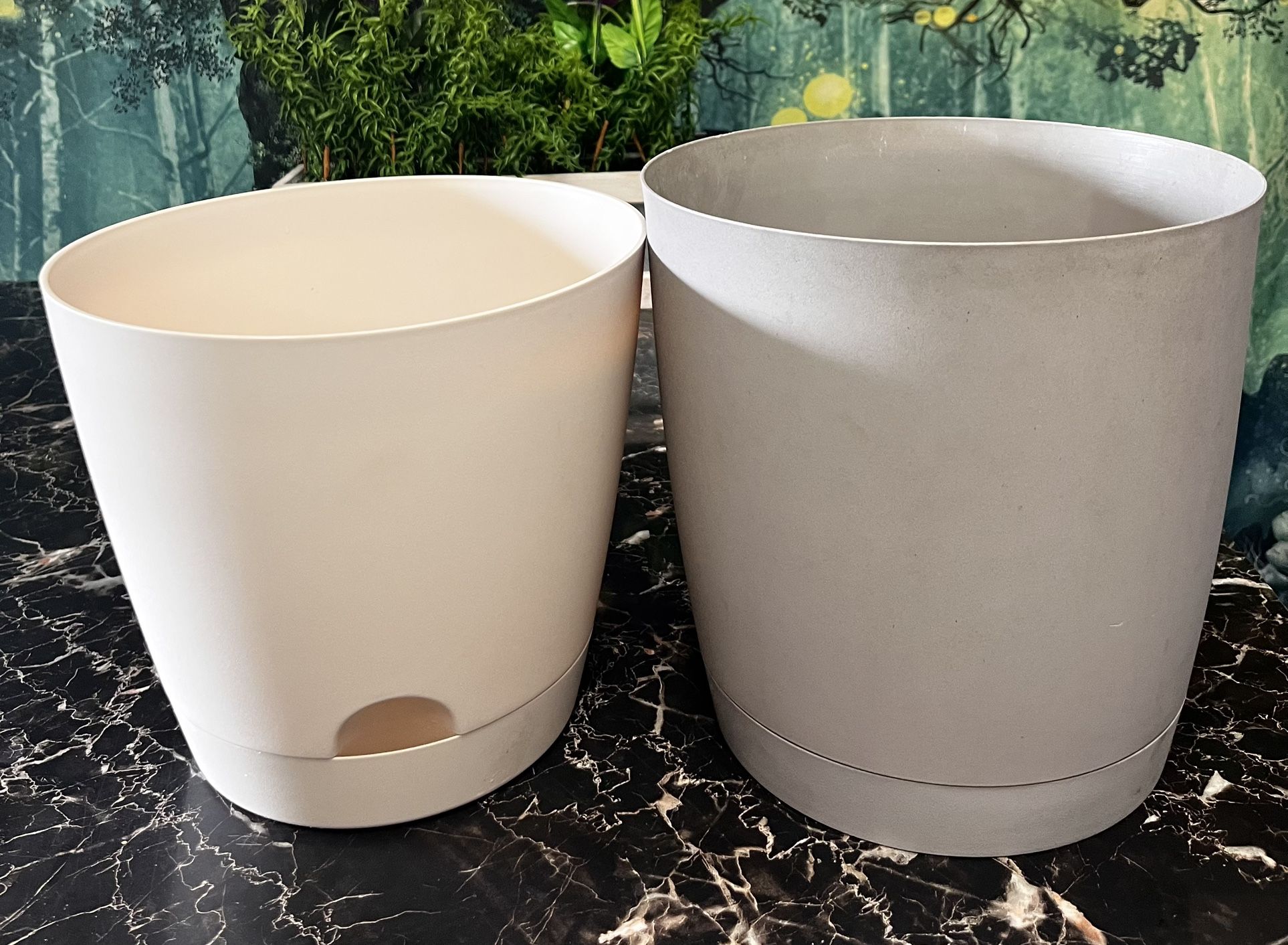 Two Nice Planter Pots.   Left is 10” Diameter x 8.6” H and Right is 9.75” Diameter x 9.75” H. 