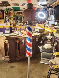 Barber pole coat hanger