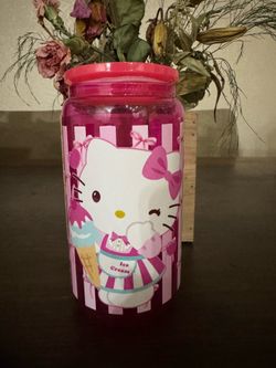 Glass cup with lid and straw