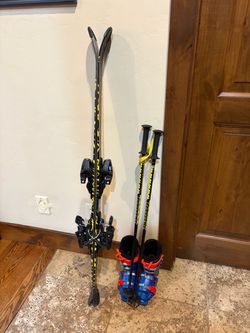 Downhill  skis, polls and boots for 7-9 year old