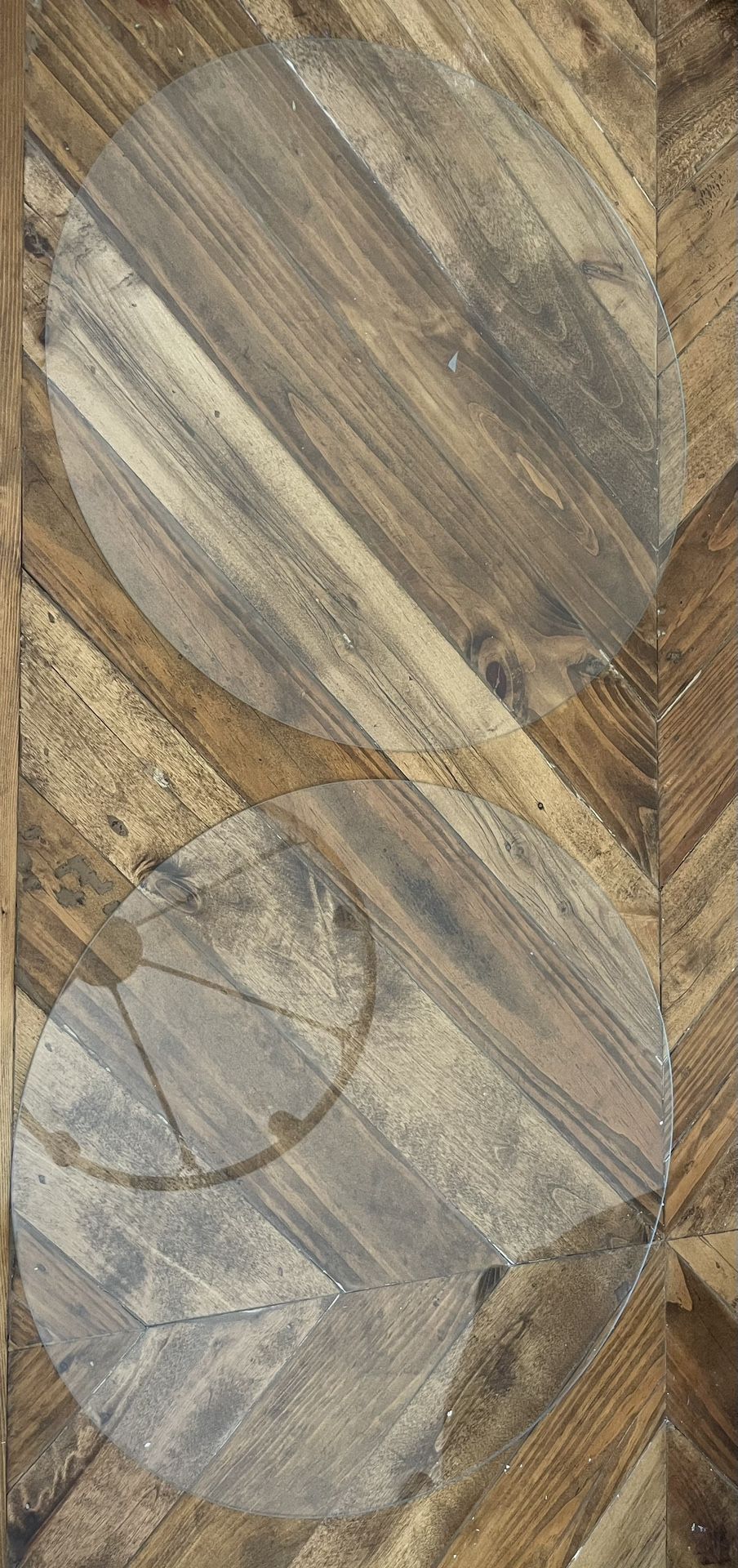 Two Circular Pieces Of Glass