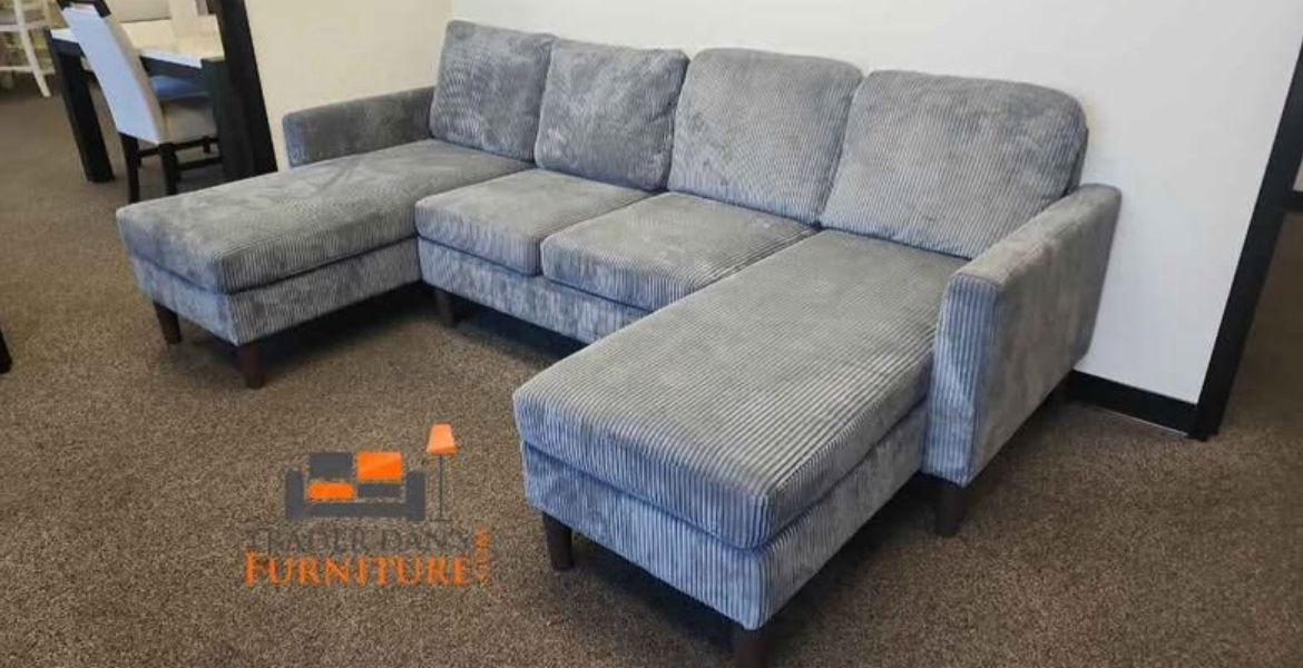 Brand new grey corduroy Sectional Sofa with chaise on each side.