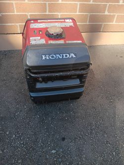 Honda generator with electric start and pull start model EU3000is inverter with owners manual runs great