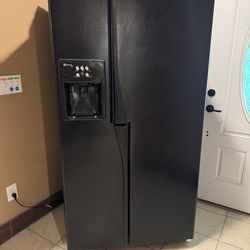 Maytag Plus Refrigerator and freezer side by side with ice maker and water dispenser/ filter