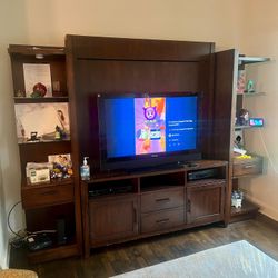 Spacious entertainment center with shelves and storage.its another 18”D96”W and 75”H
