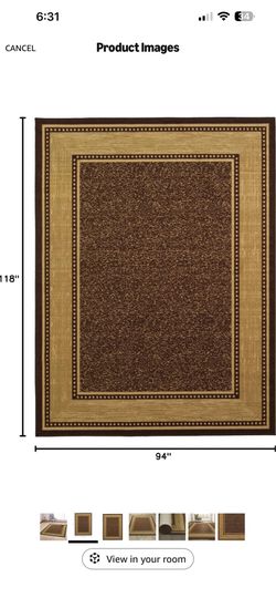 Brown and Tan bordered area rug. 94” by 118”