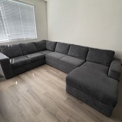 Sectional w/ Storage & Convertible Cushion