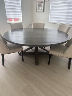 Large Round Dark Wood Dining Table