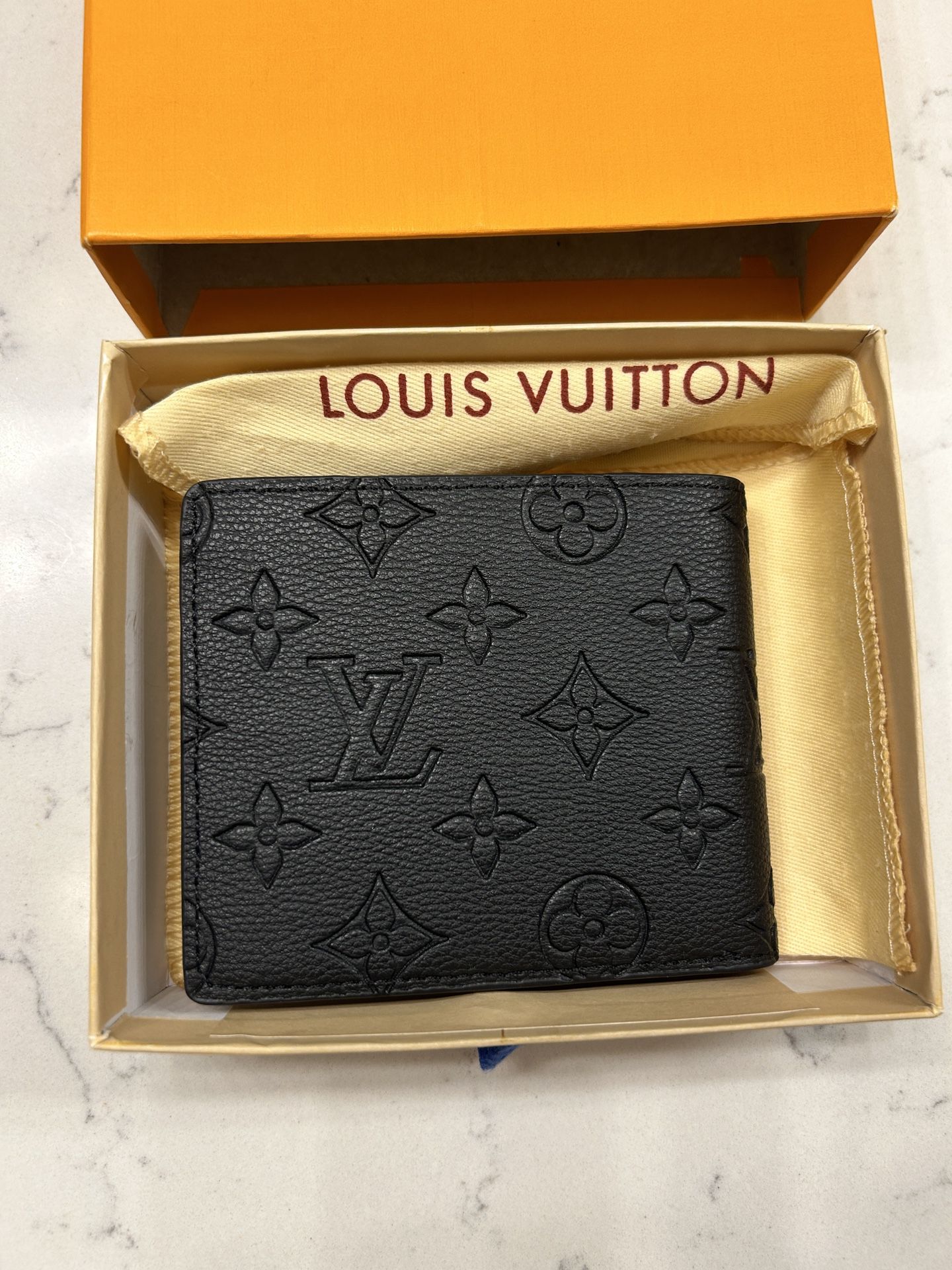 Louis Vuitton “Multiple Wallet” 