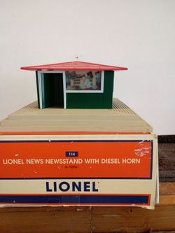 Model train newsstand with horn