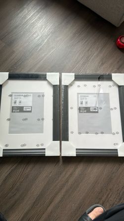 IKEA EDSBRUK picture frame in black with a white mount, measuring 31x41 cm