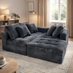 Brand new module sectional sofa boneless dark gray with ottoman worth 900