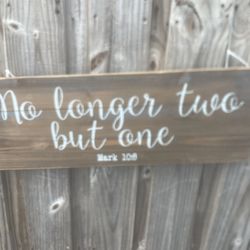 rustic wooden wall sign featuring the bible verse "No longer two but one Mark 10:8