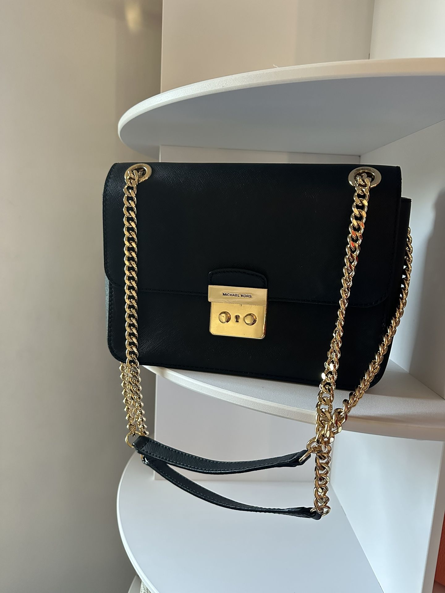 Michael Kors black and gold shoulder bag