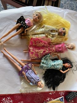 Used 5 Dolls 