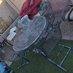 $400   WOODARD RARE IRON  ROCKING CHAIRS AND TABLE