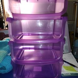Four Small Stackable Containers
