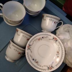 7 cups and 7 saucers set 