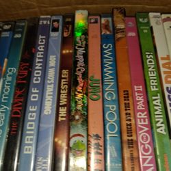 Hundreds  Of Dvds , Also Hard Back Books And Paperback  Books 