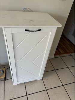 Tilt out trash can