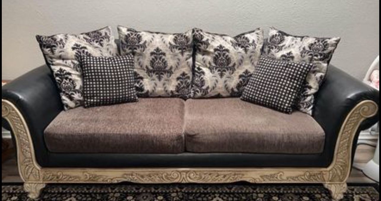 Black and white wood frame sofa