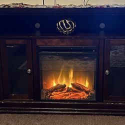Tv Stand With Electric Fireplace, Color Brown.
