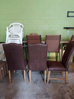 3 Brown studded Accent Chairs