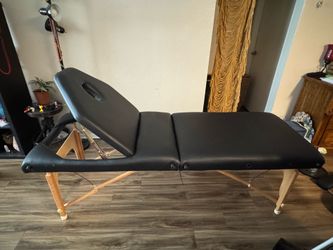 Massage table