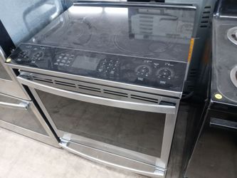 GE stainless steel induction glass-top slide-in range - Free delivery