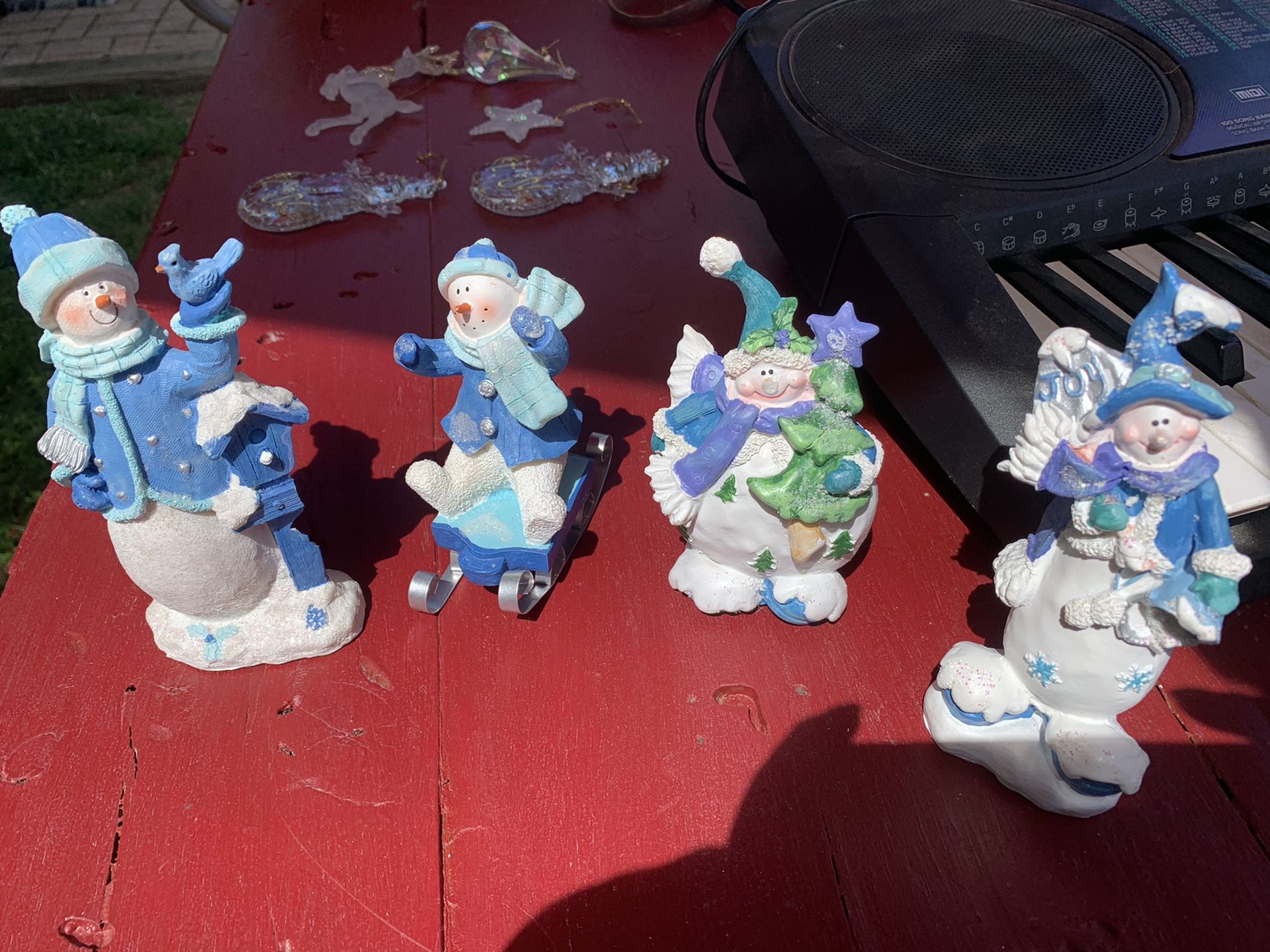 4 piece snowman figurine set