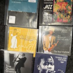 Preowned 6 music cds in good condition. Ella Fitzgerald ,Jazz Orchestra , Theodross Avery , ETC….