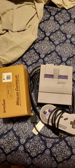 Nintendo" mini" 1 wired controller & two wireless controllers