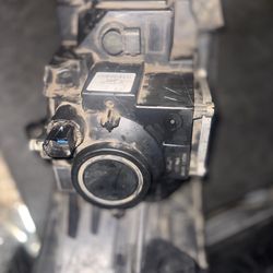 Ford flex headlight driver side