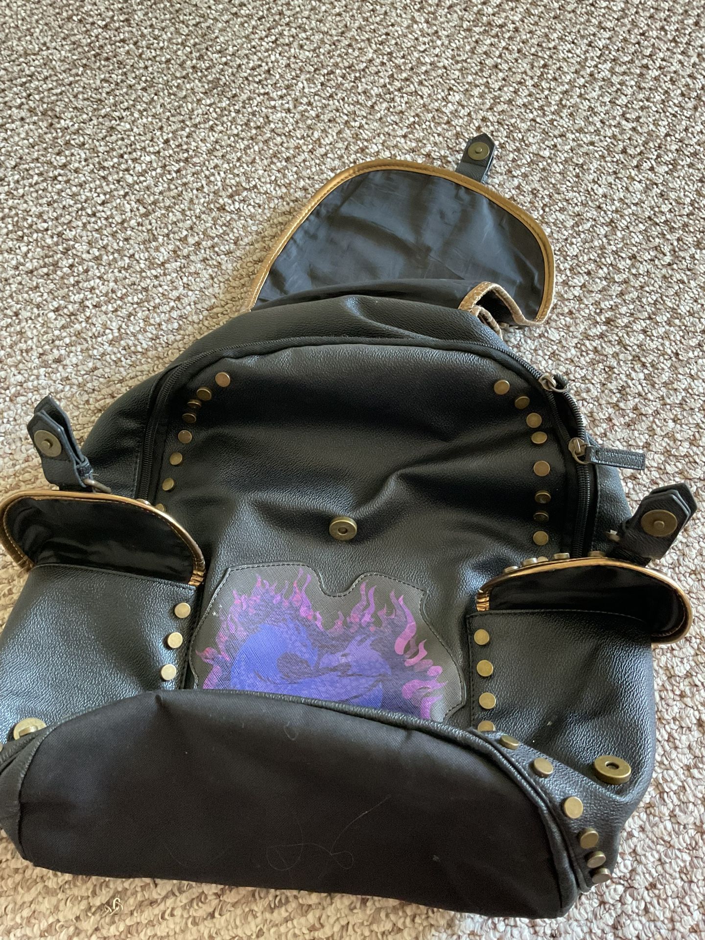 descendants 2 leather backpack Disney Mini sandstormusa Features Vegan leather (polyurethane) Adjustable shoulder straps Front zipper pocket Side drop pockets Brass Disney Descendants Rise Of Red