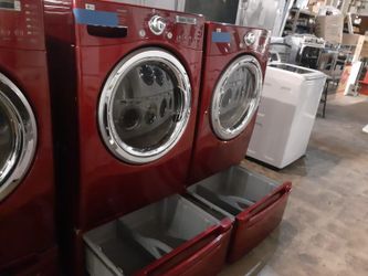 LG front load washer and electric dryer set with pedestal working perfectly with 4 months warranty